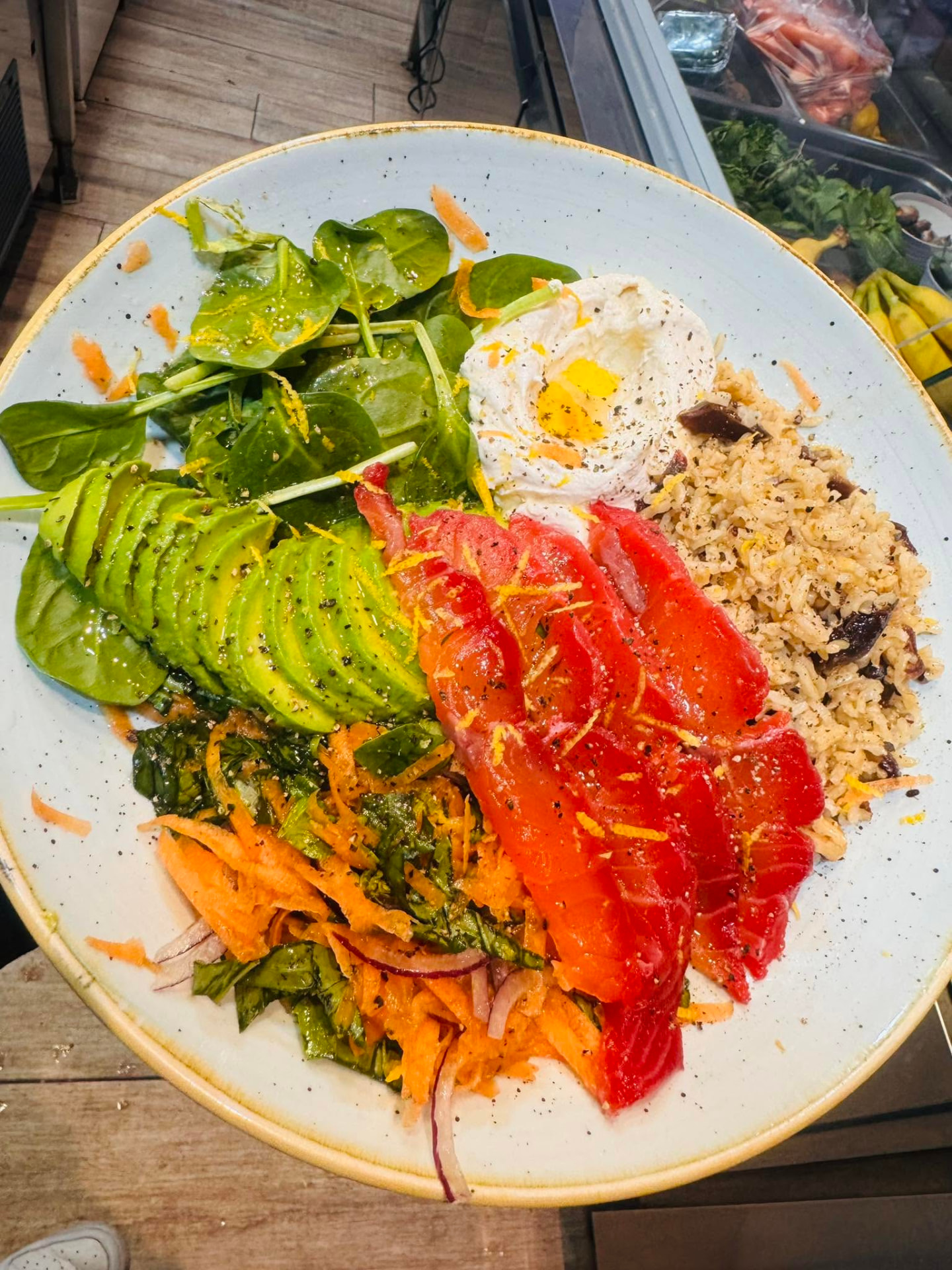 Colourful Crudo breakfast bowl with avocado, eggs and fresh vegetables
